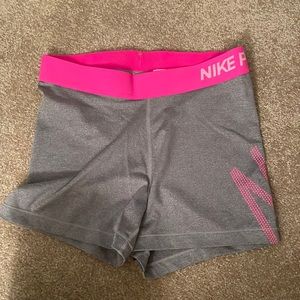 MEDIUM nike pros two tone grey and hot pink